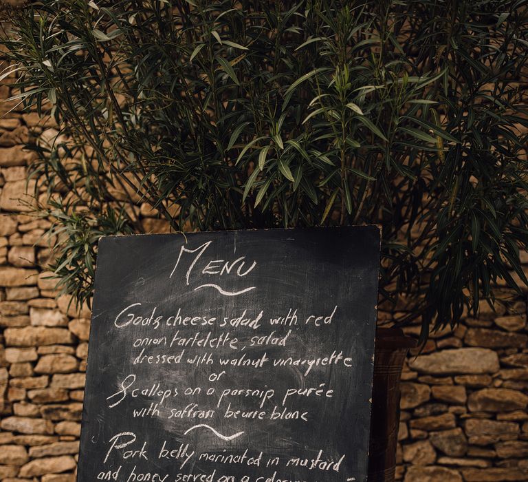 French wedding menu sign. White chalk on black board. Image by Sam Docker Photography.