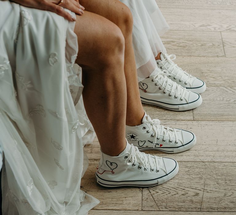 Brides wear bridal wedding converse on their wedding day