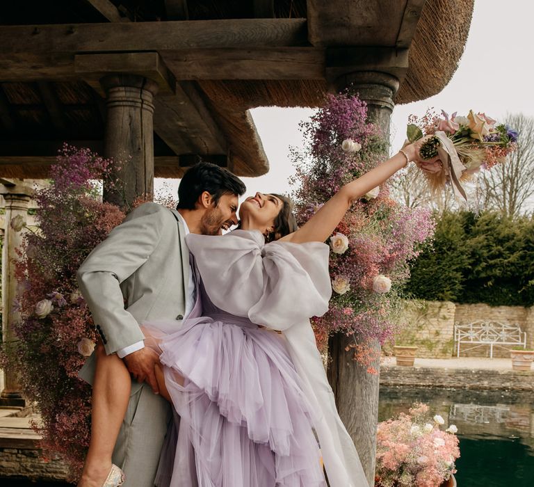 Lilac Sally Bean couture tulle wedding dress with giant bow shoulder detail 