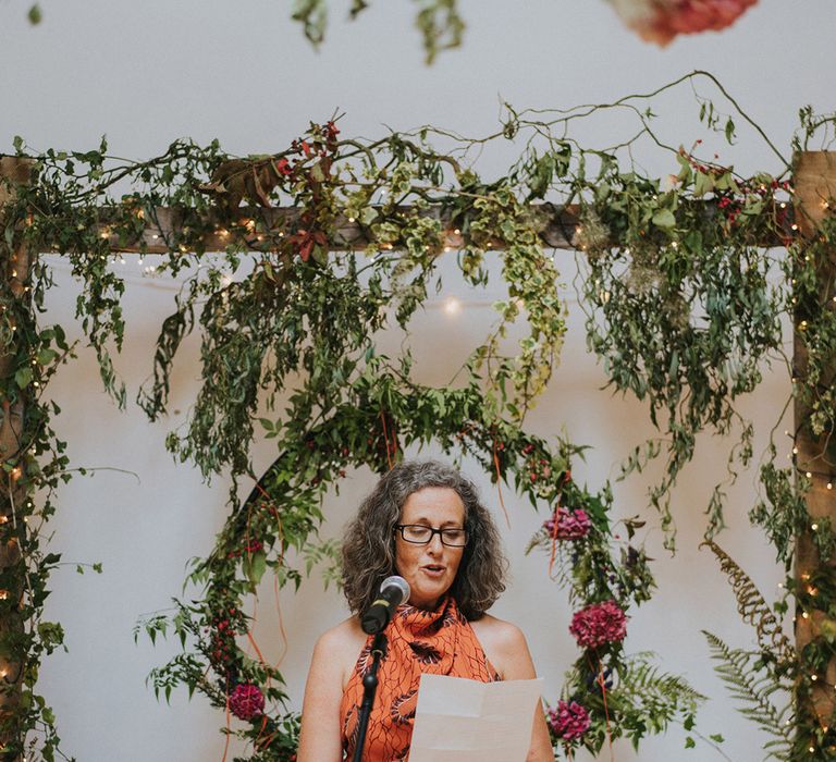 Celebrant reads during wedding day