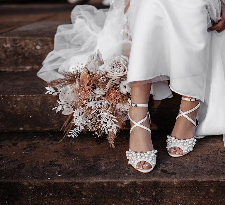 Pearl peep to Charlotte Mills wedding shoes and dried flower wedding bouquet 