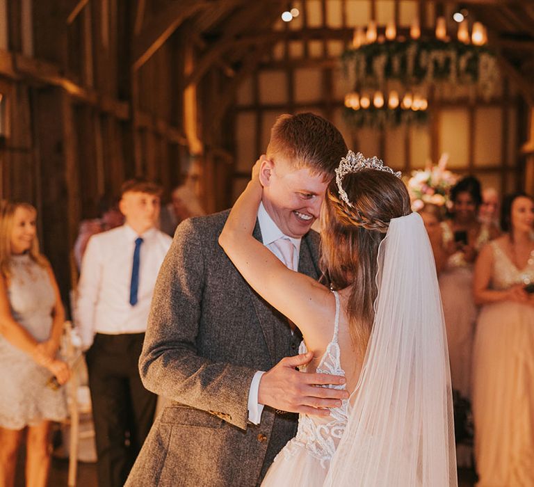 Bride and groom share first dance together