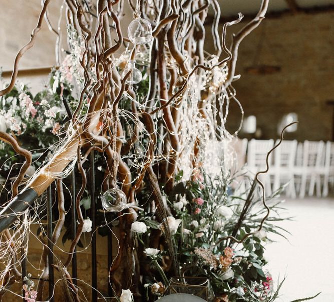 frosted acrylic wedding welcome sign resting on the steps at Hooton Tithe Barn shoot 