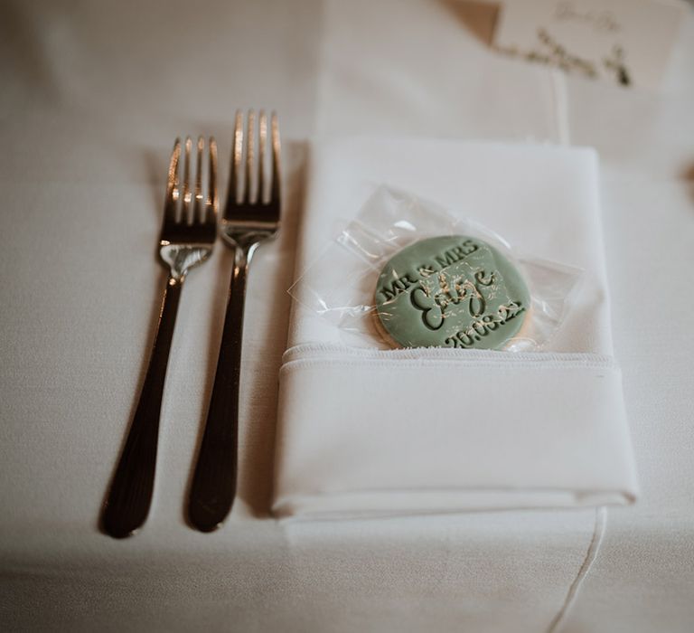 Green iced biscuit wedding favours with personalised details 