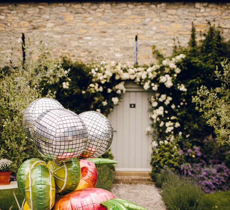 Set of wedding balloons - disco balls balloons, lime balloons, orange balloons and other fruit balloons at Middleton Lodge