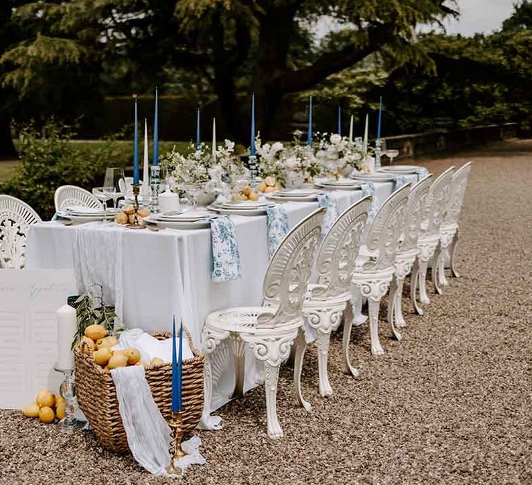 outdoor wedding tables cape with blue, white and yellow table decorations