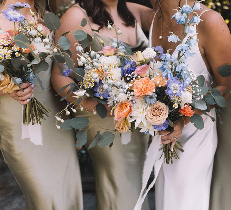 Purple and orange pastel wedding bouquets for summer wedding in Yorkshire 