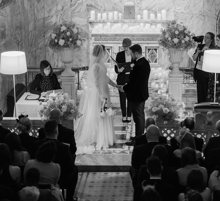 Traditional wedding ceremony at Fitzrovia Chapel with bespoke vows