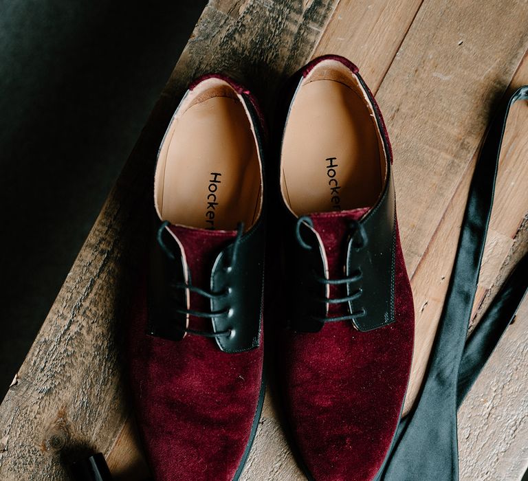 Bespoke red velvet groom shoes with Chanel cologne, watch, wedding rings and other groom's accessories for the winter wedding 