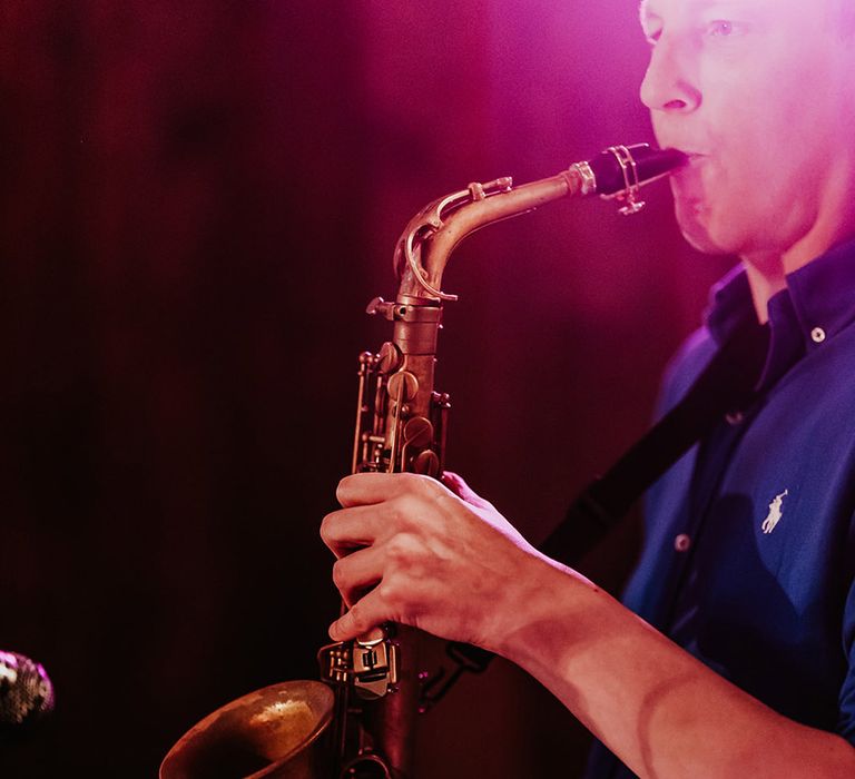 Saxophone player at the wedding reception 