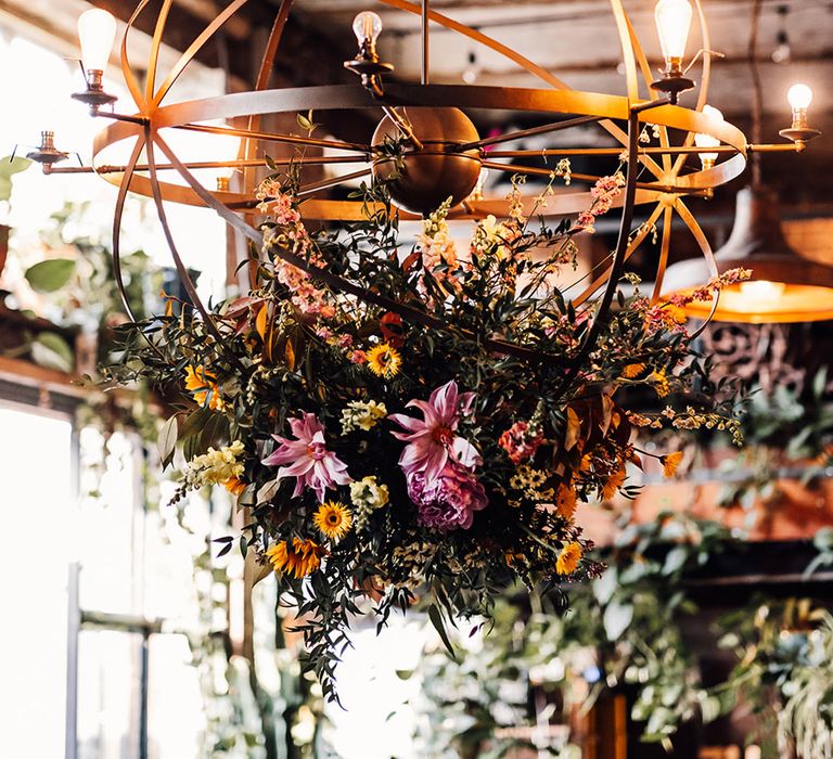 Hanging installation with pink flowers at London wedding 