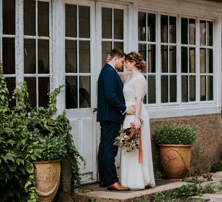 Bride and groom portrait by Photography By Chloe 