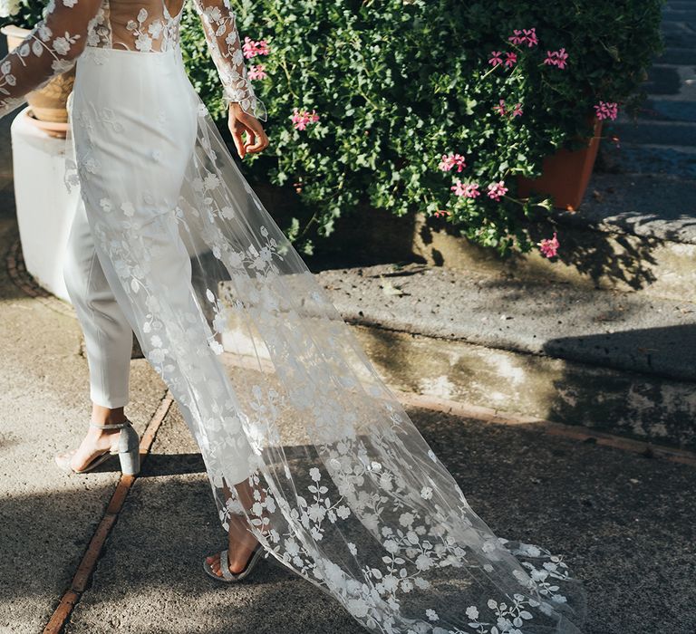 Wedding train with appliqué flower detail 