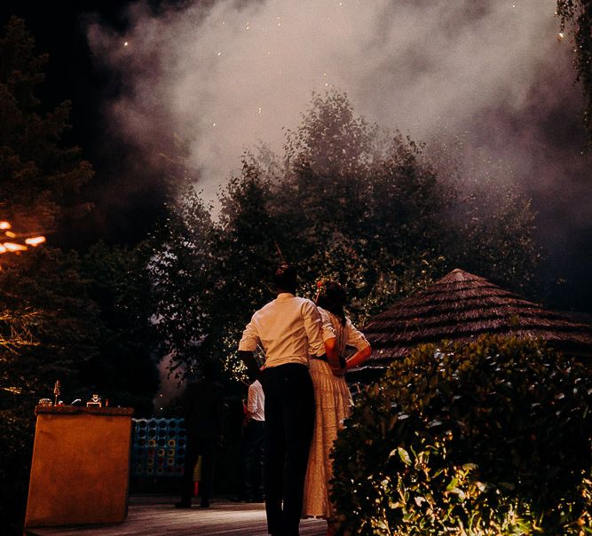 Fireworks display at an at home garden party wedding 