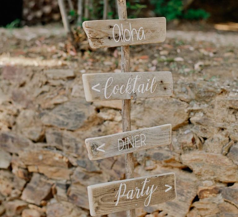 Wooden sign post sign at destination wedding in France