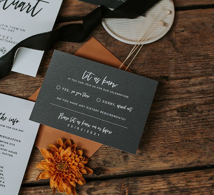 Black, white and orange contemporary wedding stationery suite with RSVP and information cards