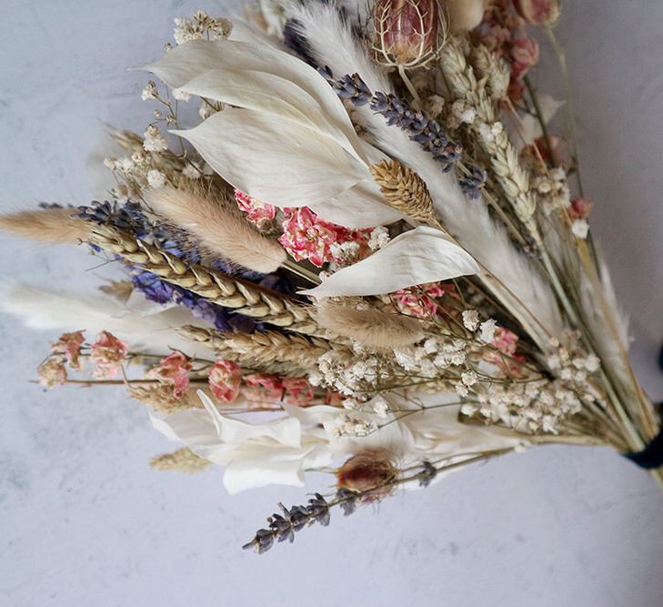 Neutrals, blue and pink dried flowers wedding bouquet