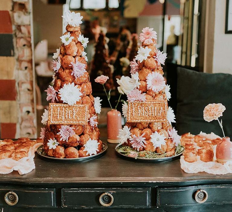 Croquembouche complete with flowers and personalised names in replacement of wedding cake