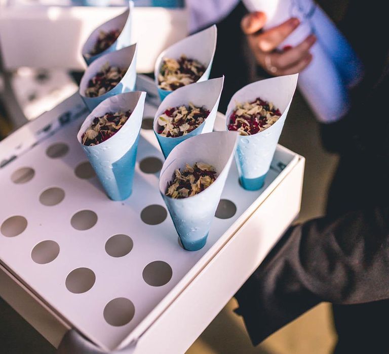 Flower petal confetti in blue cones