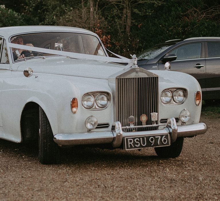 Classic white wedding car at Hedsor House wedding