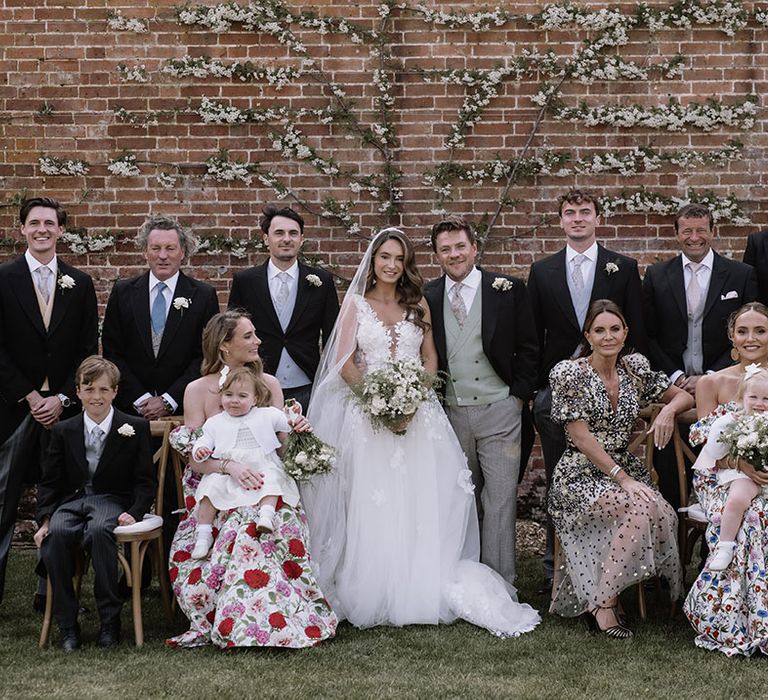 Wedding party shot for outdoor marquee wedding 