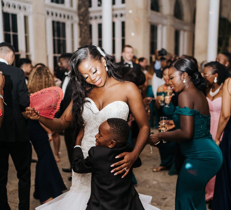 Bride dancing with the page boy 