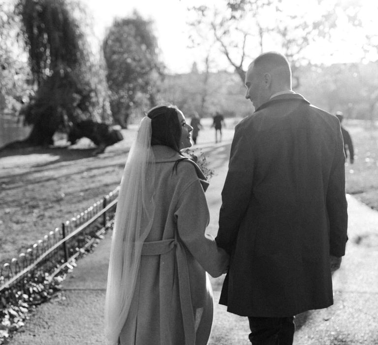 Bride and groom exploring London on their wedding day 