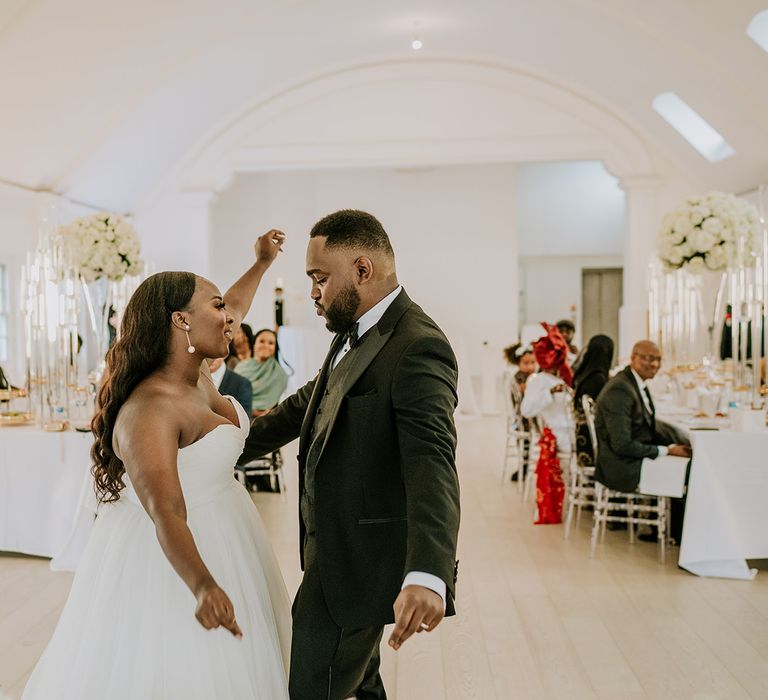 Bride & groom dance with one another during wedding reception at the Core Clapton 