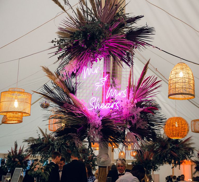 Neon wedding sign, pampas grass decor and hanging lanterns