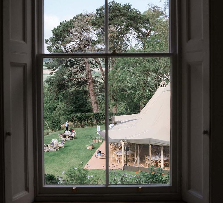 View from inside Georgian Bath home of the outdoor wedding and Buffalo Tipi reception area 