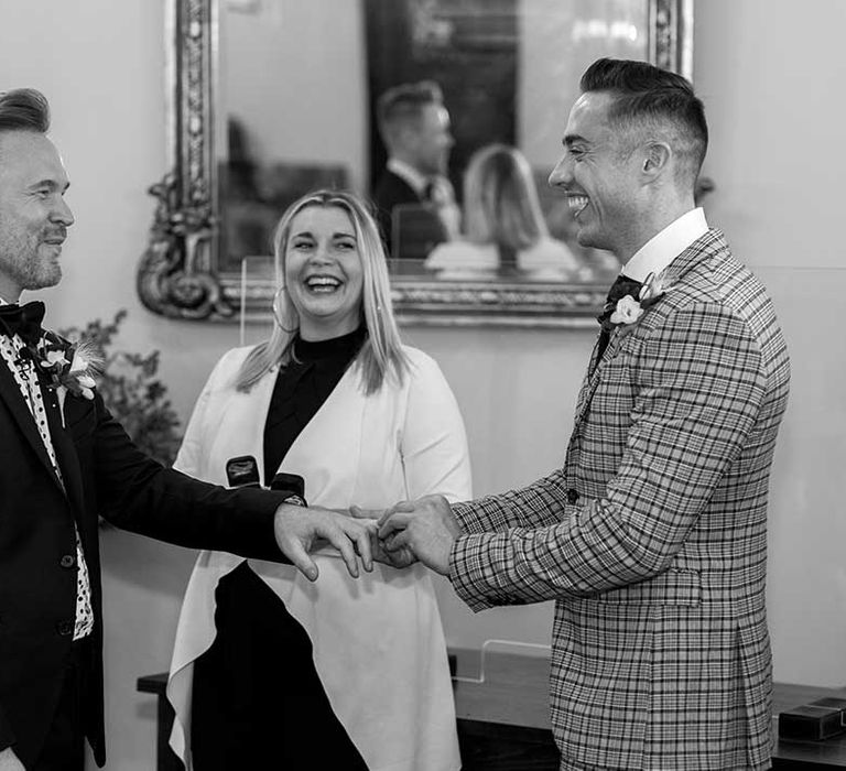 Grooms during wedding ceremony 