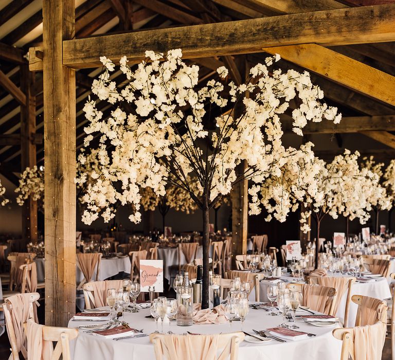 Weeping blossom tree centrepieces for chic and neutral toned tablescape 