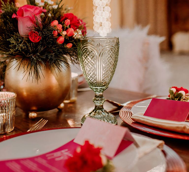 Retro, rustic wedding tablescape with hot pink stationery and gold vase centrepieces 