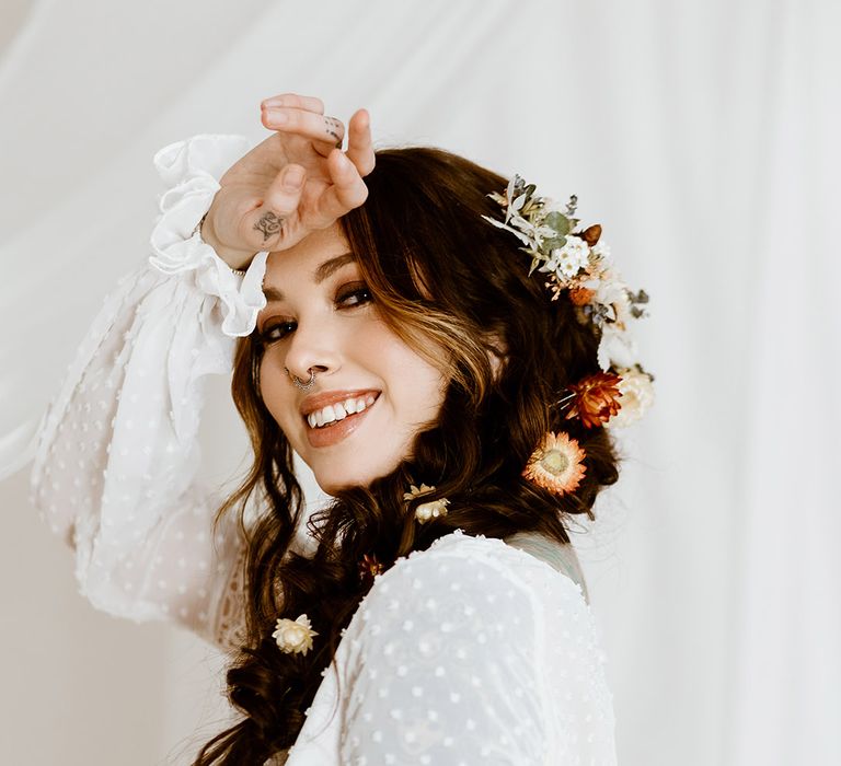 bridal separated and dried flower hair pins in side braid 