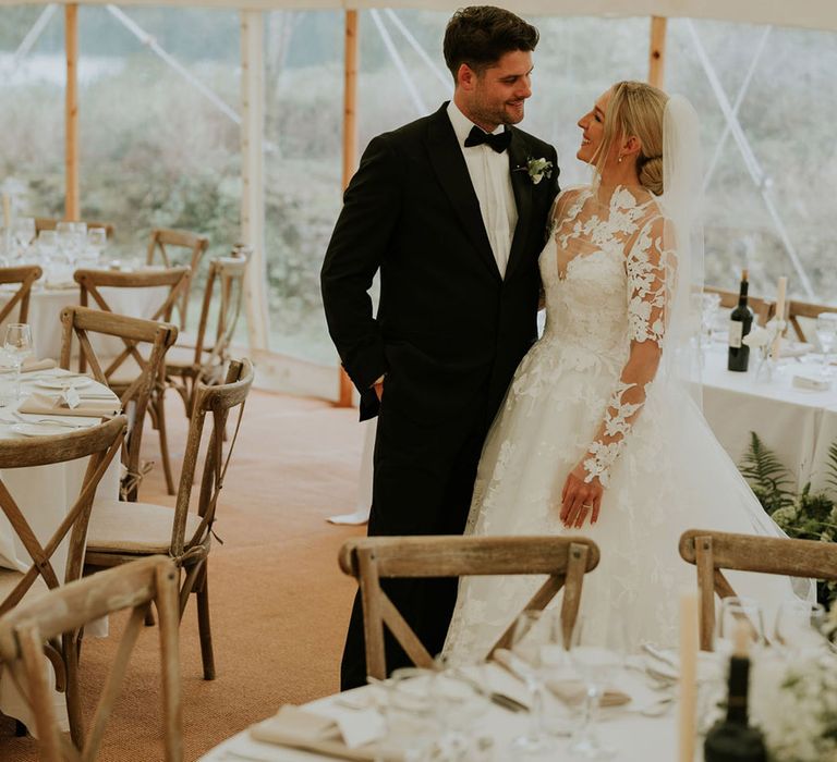 Bride and groom at their marquee wedding breakfast 