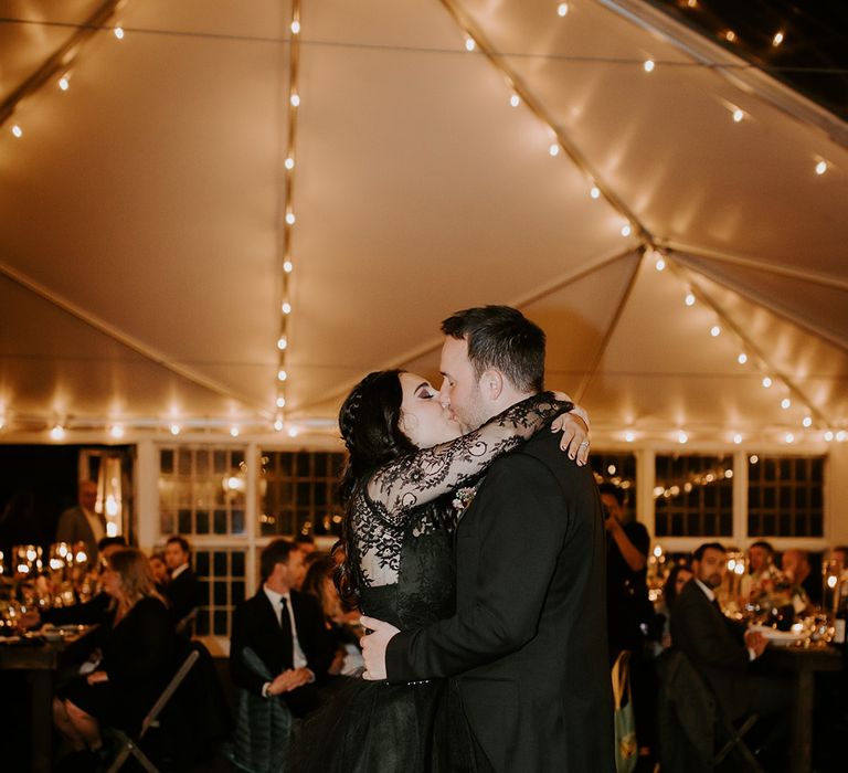 The first dance between the bride and groom in their marquee 