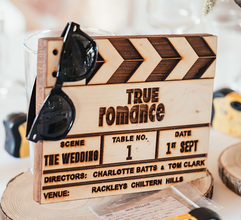 DIY wooden wedding table centrepiece inspired by the movies with props that relate to the movie 