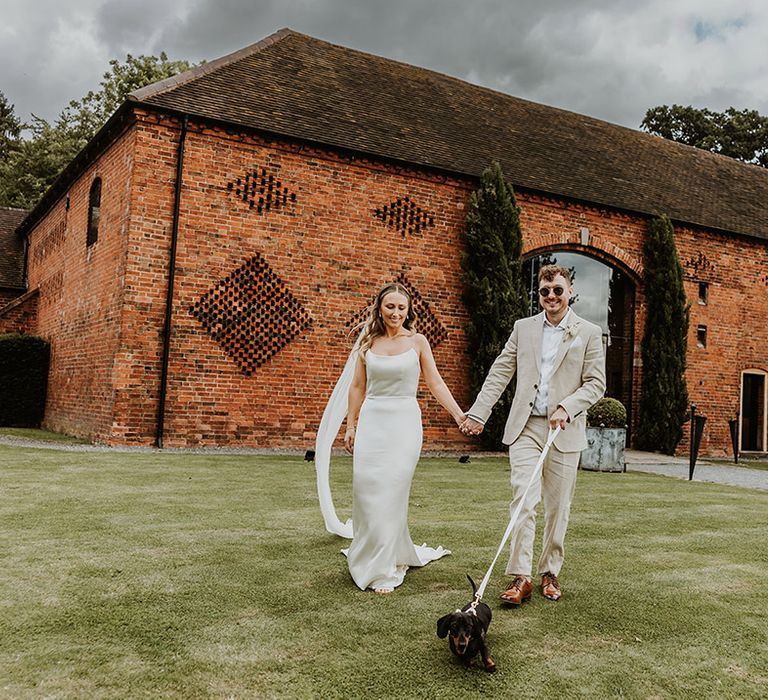 Shustoke Bros wedding with bride and groom with their pet dog 