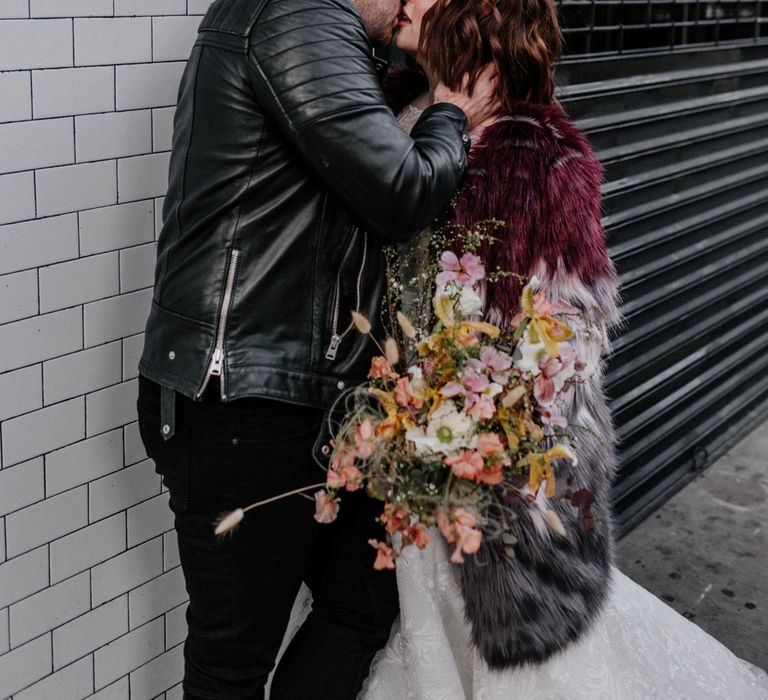 Bride & groom kiss during New York elopement