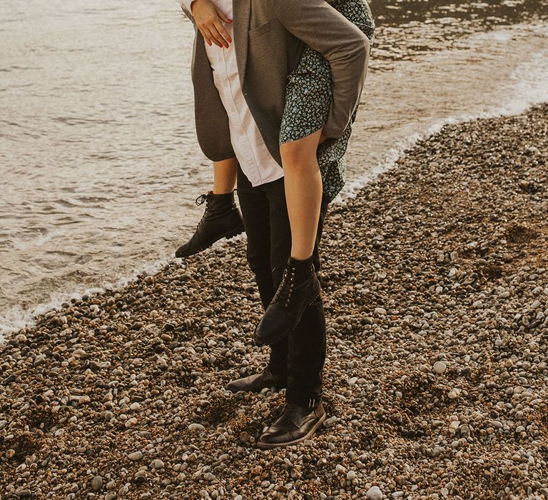 Bride and groom on coastal engagement shoot 