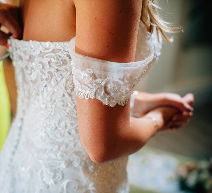 Cold shoulder lace wedding gown