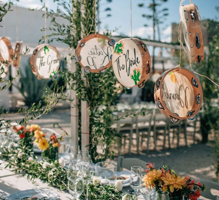 Personalised tambourine wedding favours and table place name settings for unique Italian wedding