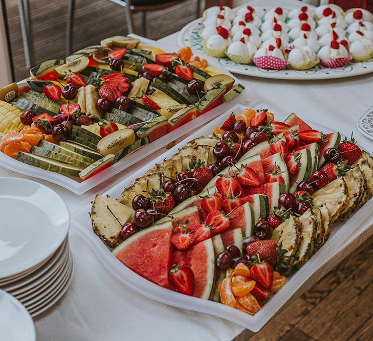 Fruit sharing platters for intimate garden wedding 