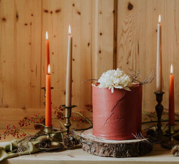 Dark red buttercream wedding cake for Autumn Dolomites elopement 