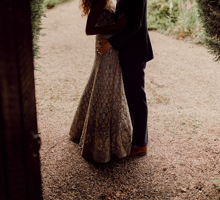 Shadowed image of bride and groom kissing on their wedding day | Joshua Gooding Photography