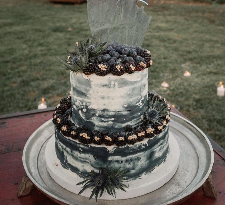 Navy and white celestial wedding cake with sugar shard wedding cake topper 