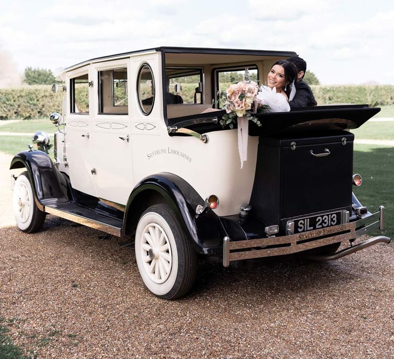 Classic vintage wedding car in black and white 