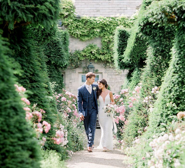 bride and groom portrait in the landscaped gardens at Wiltshire wedding venue