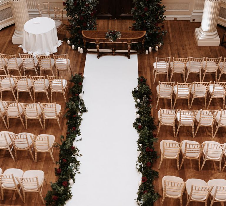 White wedding aisle with white aisle flowers and decorations at classic country house, Hedsor House 