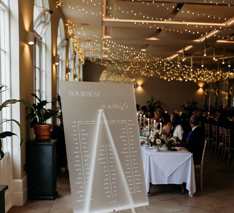 Frosted perspex wedding seating chart sign for luxe black tie wedding 